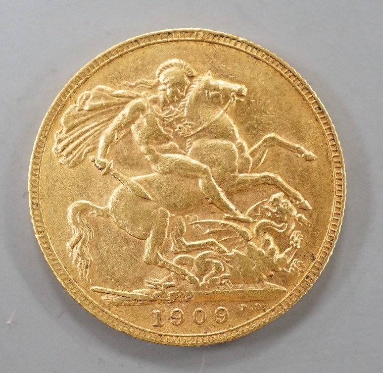 An Edward VII 1909 gold sovereign.